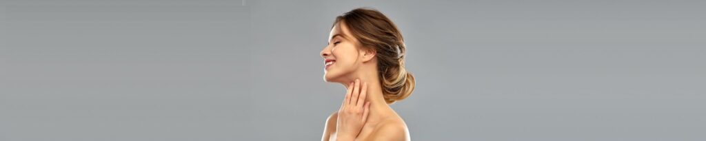 Woman touching face.